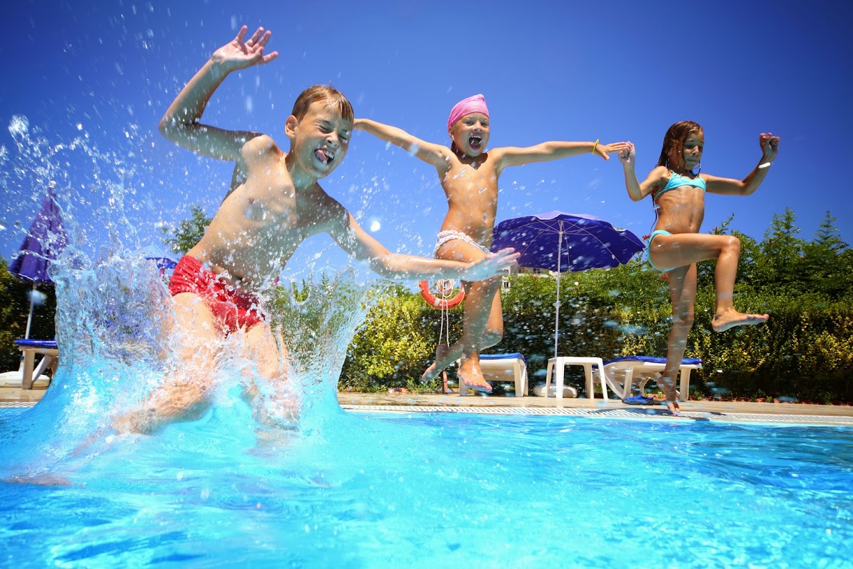kids jumping in pool