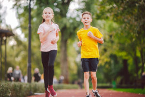 Kids Run. Healthy Sport. Child Sport, Heterosexual Twins Running